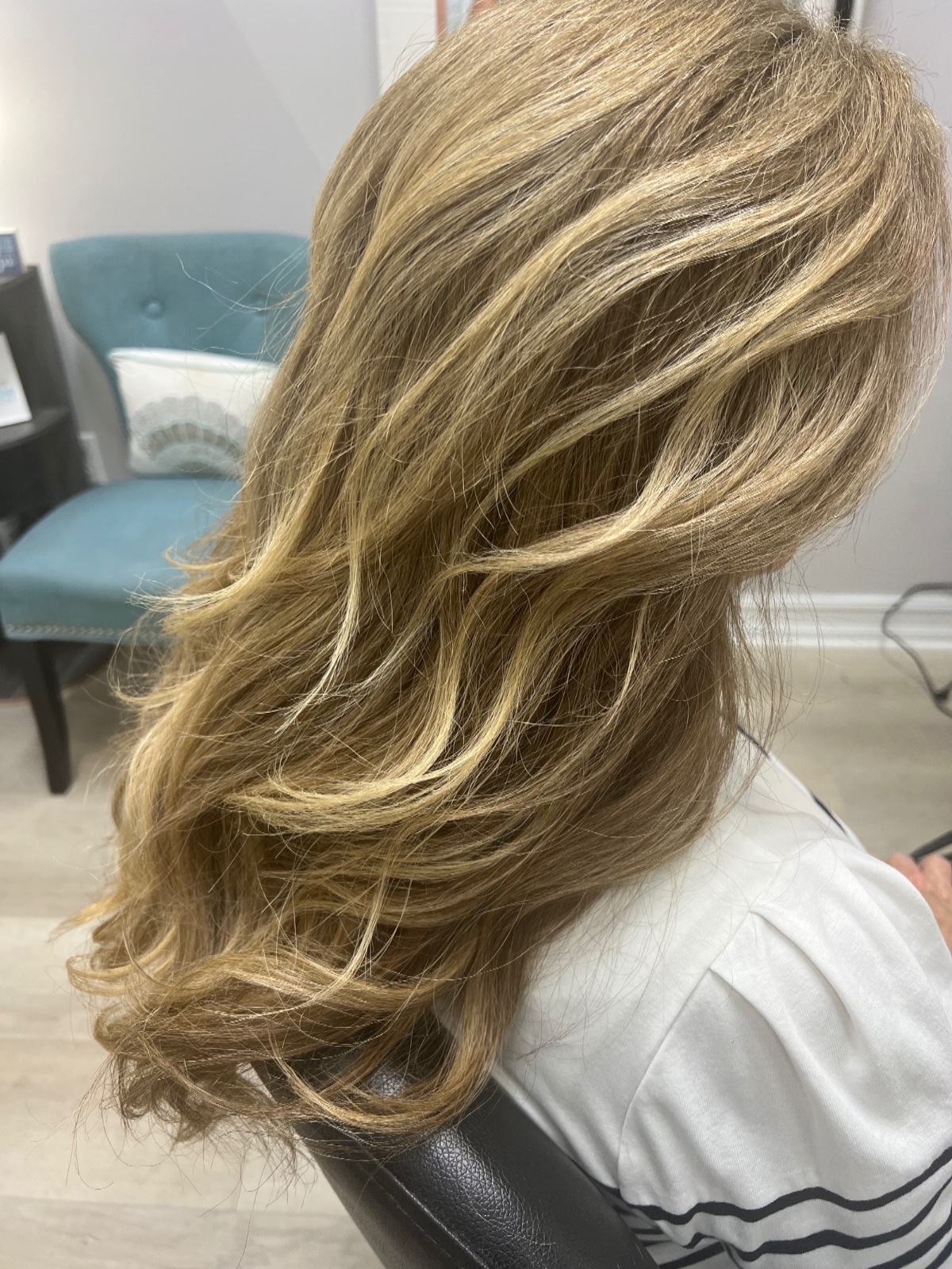 Full head highlights with cut and blow out past shoulders 